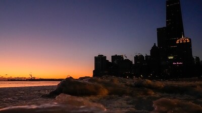 Ice builds up along the shore of Lake Michigan before the sunrise on Monday, in Chicago as the weather service issued cold weather advisories across the Great Lakes region as high temperatures in many places were expected only to rise into the single digits Monday and Tuesday. (AP/Kiichiro Sato) Ice builds up along the shore of Lake Michigan before the sunrise on Monday, in Chicago as the weather service issued cold weather advisories across the Great Lakes region as high temperatures in many places were expected only to rise into the single digits Monday and Tuesday. (AP/Kiichiro Sato)