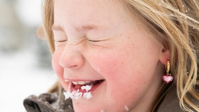 Ella Patterson reacts after taking a bite of snow during an icy winter storm, Tuesday, Jan. 21, 2025, in Kingwood, Texas. (Jason Fochtman/Houston Chronicle via AP) (AP)