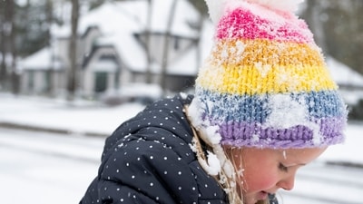 Mabel Patterson gathers snow in her front yard during an icy winter storm, Tuesday, Jan. 21, 2025, in Kingwood., Texas. (Jason Fochtman/Houston Chronicle via AP) (AP)