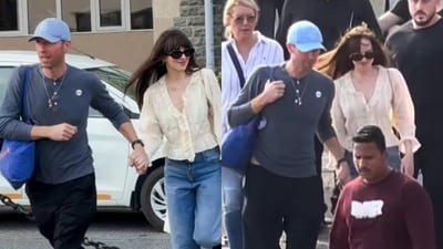 Chris Martin and Dakota Johnson head for final Coldplay concert in Mumbai. Chris Martin and Dakota Johnson head for final Coldplay concert in Mumbai.