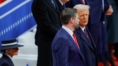 US President Donald Trump and US Vice President JD Vance speak in front of first lady Melania Trump during a rally on the inauguration day of his second Presidential term, inside Capital One, in Washington, US January 20, (REUTERS)