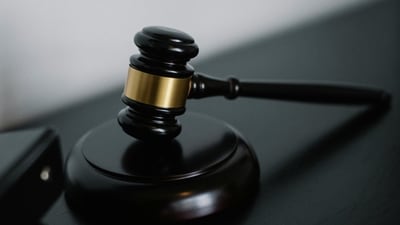 Christian, the mastermind behind this elaborate ruse, wielded his gavel to pass judgments in favour of his clients. Christian, the mastermind behind this elaborate ruse, wielded his gavel to pass judgments in favour of his clients.