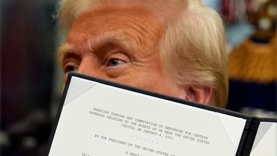 President Donald Trump signs an executive order pardoning about 1,500 defendants charged in the Jan. 6 attack on the U.S. Capitol in the Oval Office of the White House, Monday, Jan. 20, 2025, in Washington. (AP) President Donald Trump signs an executive order pardoning about 1,500 defendants charged in the Jan. 6 attack on the U.S. Capitol in the Oval Office of the White House, Monday, Jan. 20, 2025, in Washington. (AP)