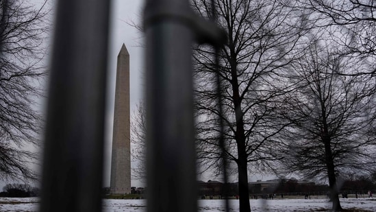 On Tuesday and Wednesday, the storm is expected to move eastward along the Gulf Coast and across the Southeast after starting late Monday in eastern and southern Texas. In pic: The Washington Monument is seen through fencing as people brave the winter weather on the National Mall days ahead of the 60th Presidental Inauguration on January 18, 2025 in Washington, DC.&nbsp;(AFP/Kent Nishimura )