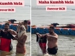 An RCB fan is dipping the team's jersey in Sangam at Mahakumbh. An RCB fan is dipping the team's jersey in Sangam at Mahakumbh.