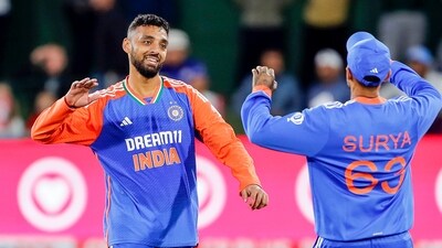 India's Varun Chakaravarthy and Suryakumar Yadav celebrate (Surjeet Yadav) India's Varun Chakaravarthy and Suryakumar Yadav celebrate (Surjeet Yadav)