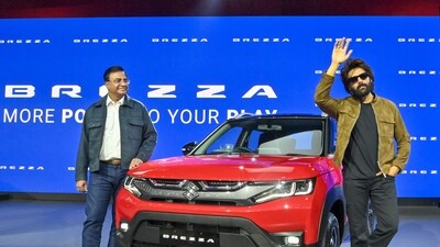 Actor Kartik Aryan and a representative for Maruti Suzuki India, Partho Bannerjee, launched a new marketing campaign for the Maruti Brezzaa at the expo. (Sanjay Sharma)