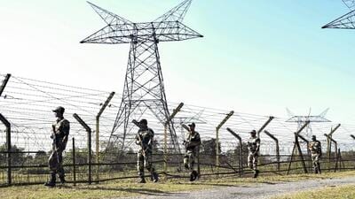 Border Security Force (BSF) personnel patrol the border with Bangladesh near the Fulbari Border post 20 km from Siliguri on Dec 2. (PTI File) Border Security Force (BSF) personnel patrol the border with Bangladesh near the Fulbari Border post 20 km from Siliguri on Dec 2. (PTI File)