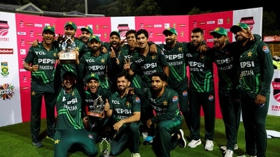 Pakistan's players pose with the winner's trophy (AFP) Pakistan's players pose with the winner's trophy (AFP)