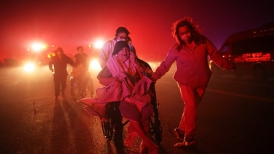 Residents of a senior centre are evacuated as the Eaton Fire approaches Jan. 7, 2025, in Altadena, Calif. (AP) Residents of a senior centre are evacuated as the Eaton Fire approaches Jan. 7, 2025, in Altadena, Calif. (AP)