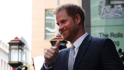 (FILES) Britain's Prince Harry, Duke of Sussex, makes a thumbs-up sign as he leaves the Royal Courts of Justice, Britain's High Court, in central London on June 7, 2023. Prince Harry dramatically settled on January 22, 2025, a hotly disputed lawsuit against Rupert Murdoch's UK tabloid publisher, which apologised for hacking the British royal's phone and agreed to pay him "substantial damages". (AFP) (FILES) Britain's Prince Harry, Duke of Sussex, makes a thumbs-up sign as he leaves the Royal Courts of Justice, Britain's High Court, in central London on June 7, 2023. Prince Harry dramatically settled on January 22, 2025, a hotly disputed lawsuit against Rupert Murdoch's UK tabloid publisher, which apologised for hacking the British royal's phone and agreed to pay him "substantial damages". (AFP)