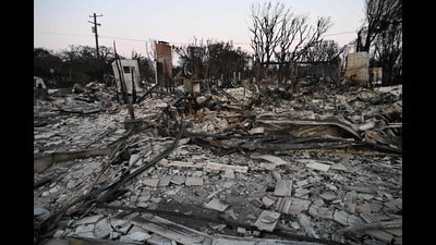 Homes reduced to rubble by the Palisades Fire are seen in the Pacific Palisades neighborhood of Los Angeles, California, on January 18, 2025. (Photo by Robyn Beck / AFP) (AFP)