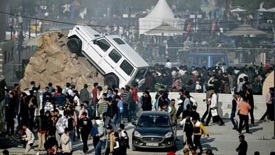 For an all-terrain vehicle, a unique display was seen with the car mounted on a rocky exhibit (AFP)