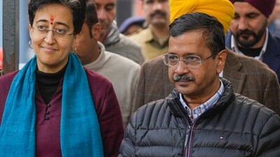 New Delhi: AAP national convener Arvind Kejriwal with Delhi Chief Minister and party leader Atishi leaves from the Election Commission office, in New Delhi, (PTI)
