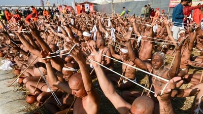 Prayagraj: Newly-initiated Naga Sadhus of Shri Panchayati Akhara Niranjani perform rituals during Mahakumbh, at Sangam in Prayagraj, Sudnay, Jan. 19, 2025. (PTI Photo) (PTI01_19_2025_000372A) (PTI) Prayagraj: Newly-initiated Naga Sadhus of Shri Panchayati Akhara Niranjani perform rituals during Mahakumbh, at Sangam in Prayagraj, Sudnay, Jan. 19, 2025. (PTI Photo) (PTI01_19_2025_000372A) (PTI)