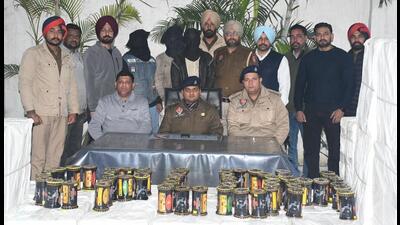Police with the seized bundles of Chinese kite strings in Jalandhar. (HT Photo)