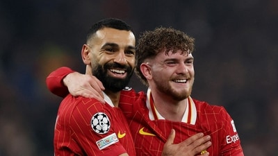 Champions League - Liverpool v Lille - Harvey Elliott celebrates with Mohamed Salah after scoring their second goal (REUTERS)