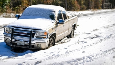 A truck is blanketed in snow following a historic winter storm on January 22, 2025 in Tallahassee, Florida. (Getty Images via AFP) A truck is blanketed in snow following a historic winter storm on January 22, 2025 in Tallahassee, Florida. (Getty Images via AFP)