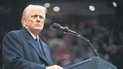 US President Donald Trump speaks during the inaugural parade inside Capital One Arena, in Washington, DC, on January 20, 2025. (AFP) US President Donald Trump speaks during the inaugural parade inside Capital One Arena, in Washington, DC, on January 20, 2025. (AFP)