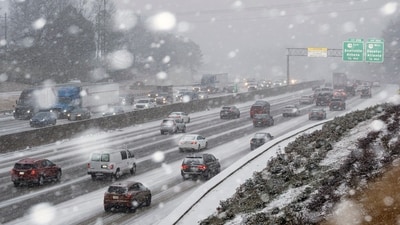 Snow begins to stick on I-285 in Tucker, Ga., as a winter storm brings snow to the South on Tuesday, Jan. 21, 2025. (AP)