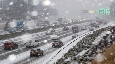 Snow begins to stick on I-285 in Tucker, Ga., as a winter storm brings snow to the South on Tuesday, Jan. 21, 2025. (Ben Gray/Atlanta Journal-Constitution via AP) (AP) Snow begins to stick on I-285 in Tucker, Ga., as a winter storm brings snow to the South on Tuesday, Jan. 21, 2025. (Ben Gray/Atlanta Journal-Constitution via AP) (AP)