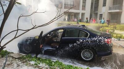 n a second fire incident on Wednesday, a luxury sedan caught fire at Unitech Horizon in Sector Pi 2, Greater Noida. (HT Photo) n a second fire incident on Wednesday, a luxury sedan caught fire at Unitech Horizon in Sector Pi 2, Greater Noida. (HT Photo)