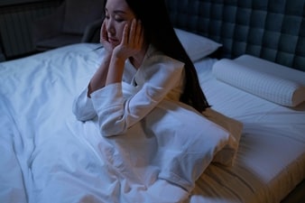 A person with ADHD can't fall asleep at night. (Pexels)
