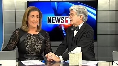 While Dayton tried to remain composed during the emotional farewell, she choked at the end and grasped Orpurt's hand for support. (WTHI-TV) While Dayton tried to remain composed during the emotional farewell, she choked at the end and grasped Orpurt's hand for support. (WTHI-TV)
