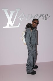 American rapper and singer-songwriter Travis Scott poses during a photocall ahead of the Louis Vuitton Paris Fashion Week show. (Photo by Thibaud MORITZ / AFP) American rapper and singer-songwriter Travis Scott poses during a photocall ahead of the Louis Vuitton Paris Fashion Week show. (Photo by Thibaud MORITZ / AFP)