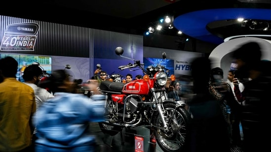 Not only cars but motorbikes by brands such as Yamaha also drew the attention of the crowd. &nbsp;(Photo by Money SHARMA / AFP)(AFP)