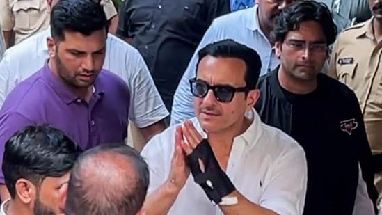 Mumbai, Jan 21 (ANI): Actor Saif Ali Khan greets as he arrives at his residence after getting discharged from Lilavati Hospital, in Mumbai on Tuesday. (ANI Photo) (ANI Grab)