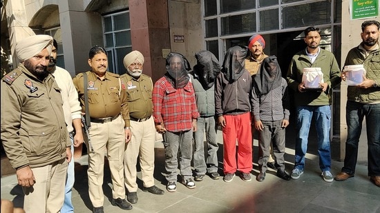 The accused in the police custody in Bathinda on Wednesday.The police booked a newly-wed couple and three others for cooking up a murder bid story at Bhagta Bhai Ka town in Bathinda. Of the five accused, four have been arrested, while the woman is admitted to a hospital. (HT Photo)
