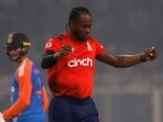 England's Jofra Archer celebrates after taking the wicket of India's Sanju Samson after a catch by England's Gus Atkinson