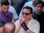 Actor Saif Ali Khan greets as he arrives at his residence after getting discharged from Lilavati Hospital, in Mumbai on Tuesday. Actor Saif Ali Khan greets as he arrives at his residence after getting discharged from Lilavati Hospital, in Mumbai on Tuesday.