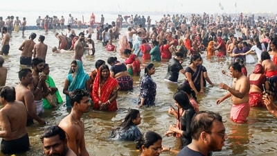 Devotees take a dip at Triveni Sangam during the ongoing Maha Kumbh 2025 in Prayagraj on Thursday, which began on January 13. (ANI) Devotees take a dip at Triveni Sangam during the ongoing Maha Kumbh 2025 in Prayagraj on Thursday, which began on January 13. (ANI)