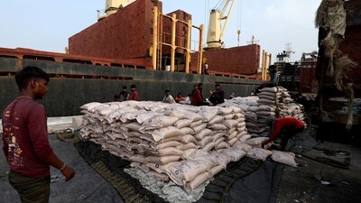 FILE PHOTO: A worker arranges sugar bags in a net to load them onto a cargo ship at the Deendayal Port in Kandla, in the western state of Gujarat, India, September 25, 2024. REUTERS/Amit Dave/File Photo (REUTERS) (HT_PRINT) FILE PHOTO: A worker arranges sugar bags in a net to load them onto a cargo ship at the Deendayal Port in Kandla, in the western state of Gujarat, India, September 25, 2024. REUTERS/Amit Dave/File Photo (REUTERS) (HT_PRINT)