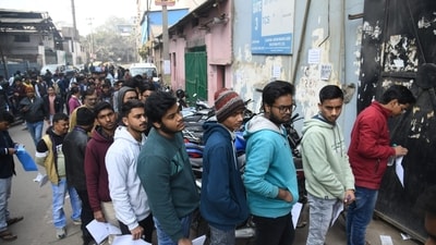 Students wait with their admit cards to appear for the JEE Mains exam at an examination centre in Patna. (Santosh Kumar) Students wait with their admit cards to appear for the JEE Mains exam at an examination centre in Patna. (Santosh Kumar)
