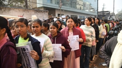Students are seen standing in queue with their admit cards to appear for the JEE Mains exam at an examination centre in Patna. (Santosh Kumar) Students are seen standing in queue with their admit cards to appear for the JEE Mains exam at an examination centre in Patna. (Santosh Kumar)
