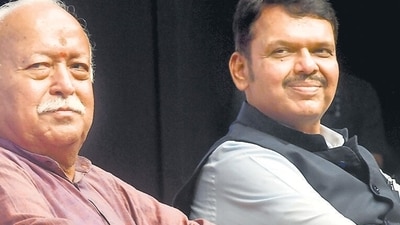 Mumbai: RSS Chief Mohan Bhagwat with Maharashtra Dy Chief Minister Devendra Fadnavis during the release of the book 'Udaan', in Mumbai, Saturday, June 29, 2024. (PTI Photo) (PTI06_29_2024_000359B) (PTI)