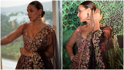 Meanwhile, the lehenga comes adorned in contrasting colourful thread embroidery and mirror work. The high waistline and a layered ghera add to its beauty. Meanwhile, the lehenga comes adorned in contrasting colourful thread embroidery and mirror work. The high waistline and a layered ghera add to its beauty. 