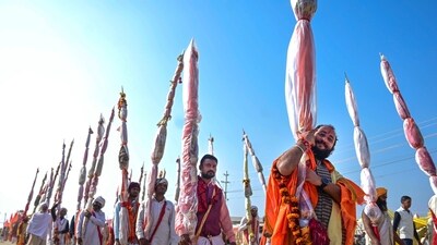 Devotees take part in a 'Shobha Yatra' during Mahakumbh Mela, at Sangam in Prayagraj. (PTI) Devotees take part in a 'Shobha Yatra' during Mahakumbh Mela, at Sangam in Prayagraj. (PTI)