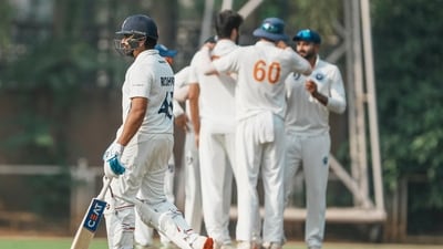 Jammu and Kashmir players celebrate the wicket Mumbai batter Rohit Sharma during the first day of the Ranji Trophy match (PTI) Jammu and Kashmir players celebrate the wicket Mumbai batter Rohit Sharma during the first day of the Ranji Trophy match (PTI)