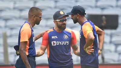 File photo of Virat Kohli (C) chatting with Hardik (L) and Krunal Pandya (R) (PTI) File photo of Virat Kohli (C) chatting with Hardik (L) and Krunal Pandya (R) (PTI)