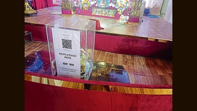 QR code pasted atop a donation box in the temple of Lord Jagannath at Sector 19 of the mela area. (HT) QR code pasted atop a donation box in the temple of Lord Jagannath at Sector 19 of the mela area. (HT)