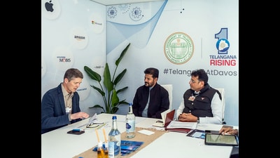 Telangana CM Revanth Reddy, state industry minister Sridhar Babu and Amazon Web Services vice president of Global Public Policy Michael Punke during the signing of an agreement, in Davos on Thursday. (ANI) Telangana CM Revanth Reddy, state industry minister Sridhar Babu and Amazon Web Services vice president of Global Public Policy Michael Punke during the signing of an agreement, in Davos on Thursday. (ANI)
