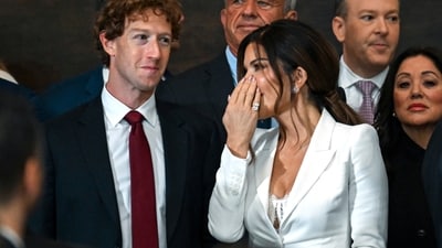 Mark Zuckerberg, left, and Lauren Sanchez stand before the 60th Presidential Inauguration in the Rotunda of the U.S. Capitol in Washington, Monday, Jan. 20, 2025. (Kenny Holston/The New York Times via AP, Pool) (AP)