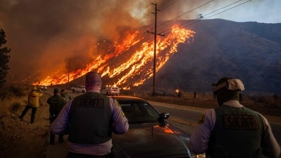 While some people were permitted to return to the burned-out Altadena and Pacific Palisades neighbourhoods to the south, officials in Los Angeles started preparing for possible rain. (AFP/Apu GOMES) While some people were permitted to return to the burned-out Altadena and Pacific Palisades neighbourhoods to the south, officials in Los Angeles started preparing for possible rain. (AFP/Apu GOMES)