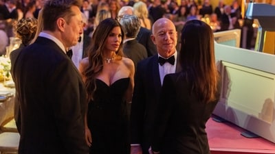 Amazon CEO Jeff Bezos, Lauren Sanchez and Elon Musk attend a candlelight dinner hosted by US President Donald Trump at the National Building Museum in Washington, DC. (REUTERS)