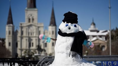 A snowman stands near Jackson Square after a rare winter snowstorm churned across the U.S. Gulf Coast, in New Orleans, Louisiana (REUTERS)