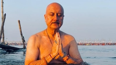 Anupam Kher takes a holy dip in Triveni Sangam.